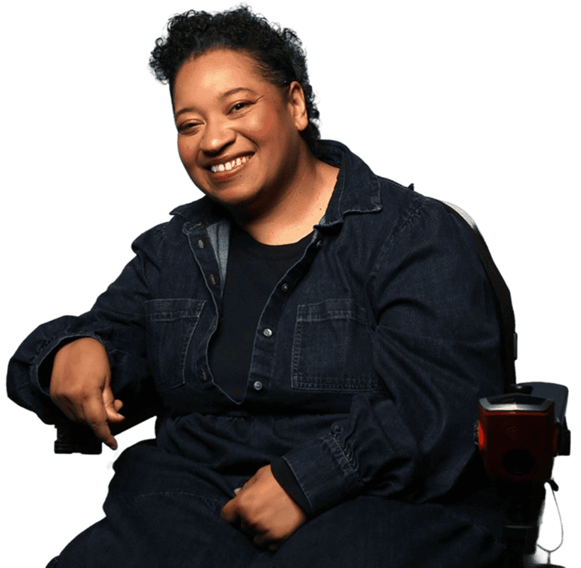 Smiling woman seated in a wheelchair against a transparent background.